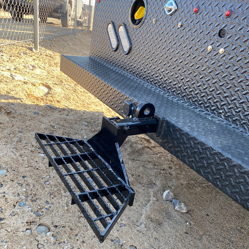 Custom diamond-plate rear step fabricated at the Largo shop