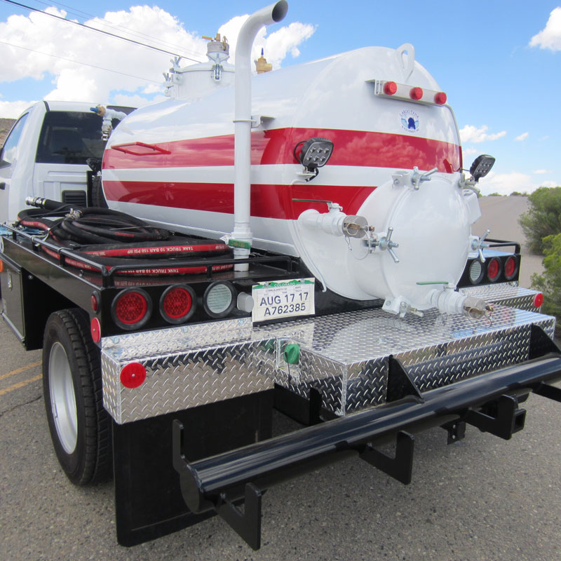 Red vacuum cargo tank mounted on a Largo-built truck